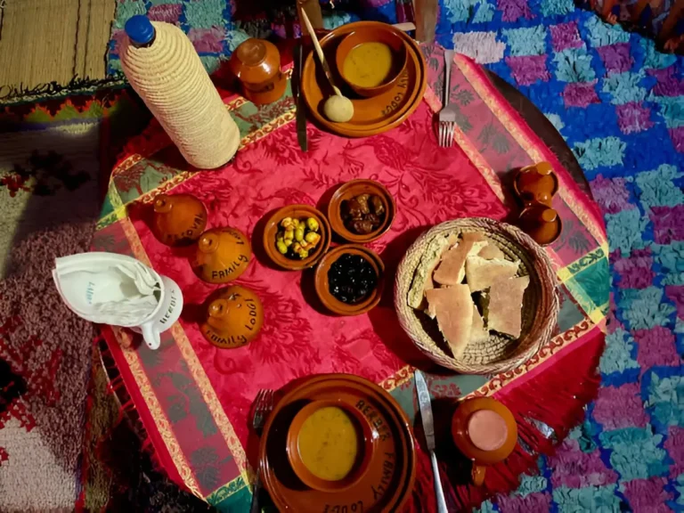 Delicious Moroccan dinner on a beautifully decorated rooftop terrace. Imlil Valley, Morocco